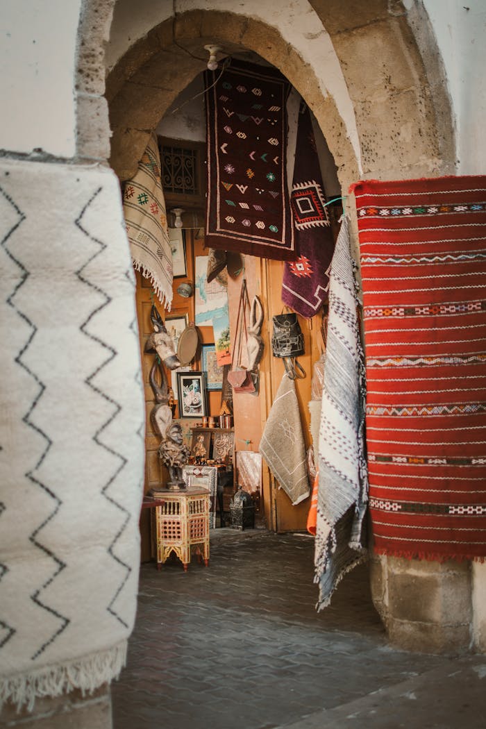 Service 1 Explore a vibrant collection of Moroccan textiles displayed in a shop in Casablanca, Morocco.